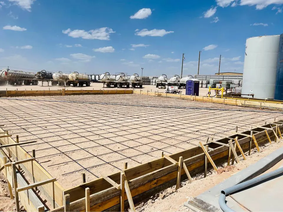 concrete flooring slab with reinforcing steel and mesh laid out. Ready to be poured with concrete. Located in San Bernardino, California